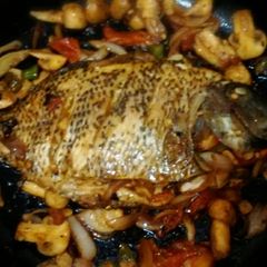 A picture of Stuffed pearl spot fish.