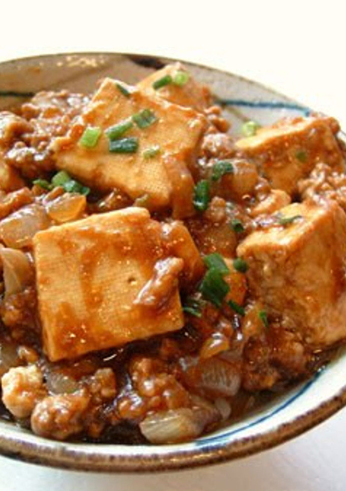 A picture of Mapo Tofu with Onions.