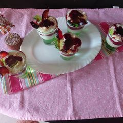 Pista custard with banana jelly & plum jam A picture of Pista custard with banana jelly & plum jam.