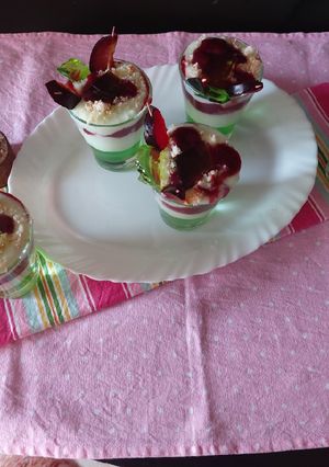 A picture of Pista custard with banana jelly & plum jam.