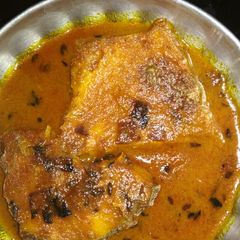 A picture of Rohu fish curry.