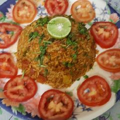 A picture of Famous Mumbai style street side spicy tawa pulao.
