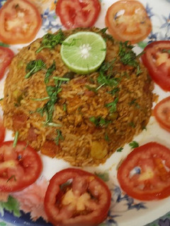 A picture of Famous Mumbai style street side spicy tawa pulao.