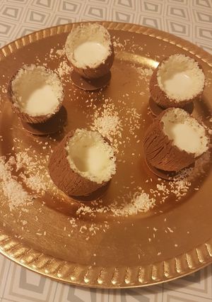 Une photo de Noix de coco à base de chocolat et lait concentré
