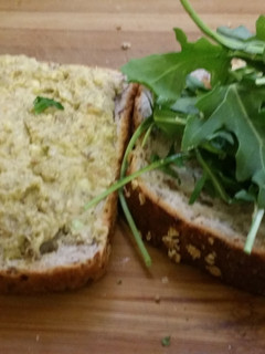 A picture of Avocado cashew sandwich.