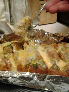 A picture of cheesy garlic bread.