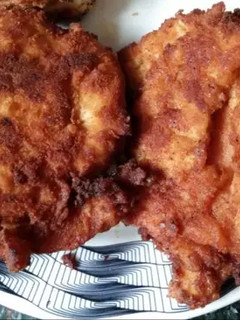 Una foto de Pechuga de pollo a la milanesa