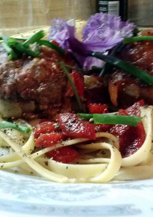 A picture of Giant stuffed kale meatballs.