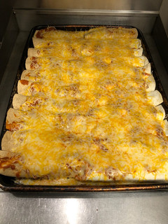 A picture of Chicken Enchiladas.
