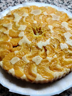 Una foto de Pastís de mandarines al forn