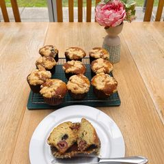 A picture of Blueberry and Cherry Muffins with Crumble Topping.