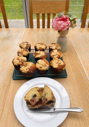 A picture of Blueberry and Cherry Muffins with Crumble Topping.