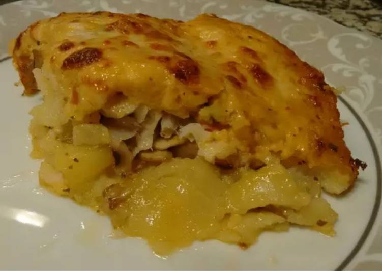 Merluza con verduras y bechamel