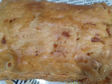 Empanada de pollo, setas, cebolla pochada y mahonesa
