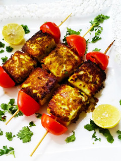 A picture of Sufiana Sizzling Paneer tikka.