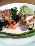 Garden Chicken with Marinated Fresh Mozeralla, Garlic Kale, butter seared Asparagus and Guacamole topping