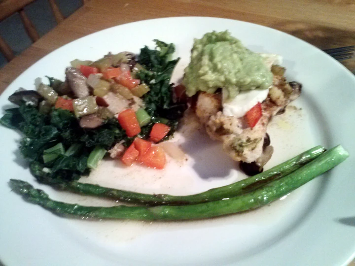 Easy Ways Make Recipes Garden Chicken with Marinated Fresh Mozeralla, Garlic Kale, butter seared Asparagus and Guacamole topping the So Delicious Tasty.