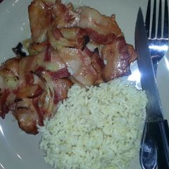 A picture of Overloaded bacon apple porkchops.