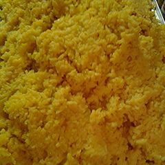 A picture of Turmeric sofrito rice for forty.