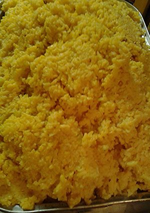 A picture of Turmeric sofrito rice for forty.