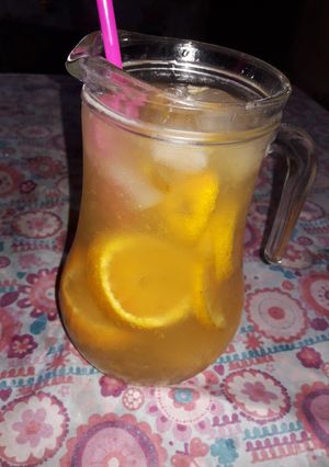 Una foto de Agua saborizada de Naranja 🍊🍊