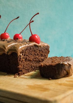 A picture of Eggless Chocolate Cake with Chocolate Cream Cheese Frosting.