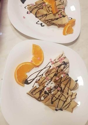 O poză a rețetei Clătite cu nutela și bucăți de banană.
