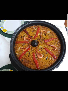 Una foto de Paella de marisco
