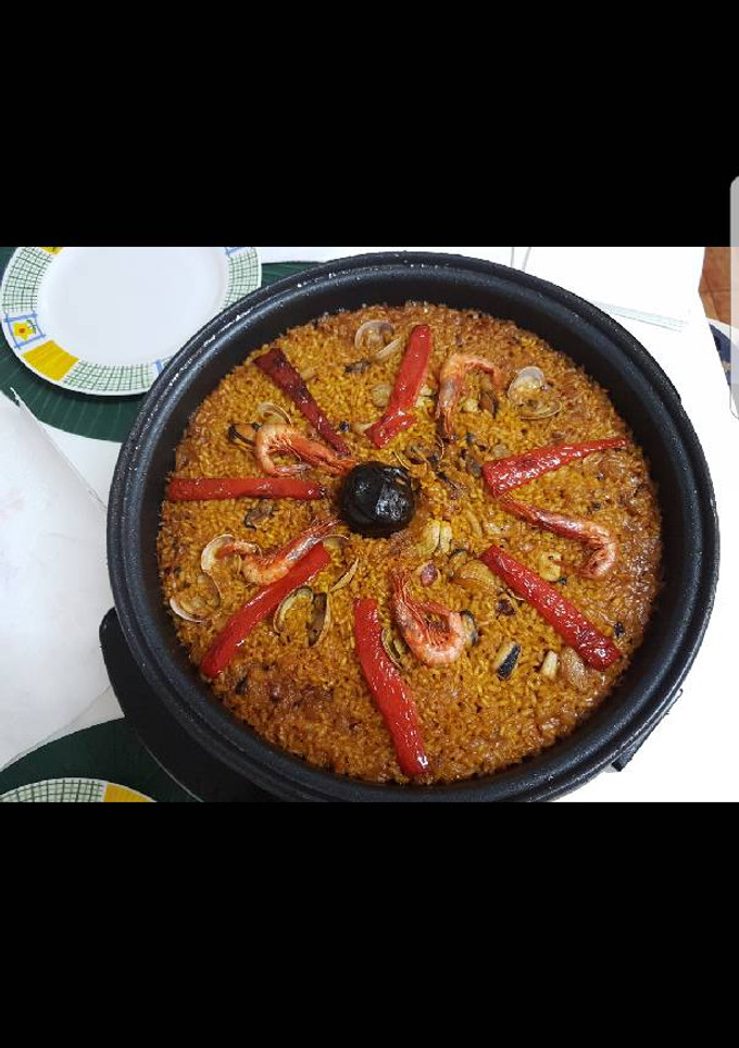 Una foto de Paella de marisco