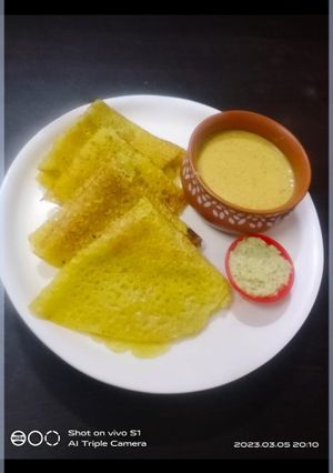 A picture of Tavsole (cucumber dosa) and Naral ras (coconut milk sweet).