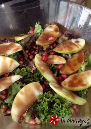 A picture of Festive salad with a pomegranate dressing.