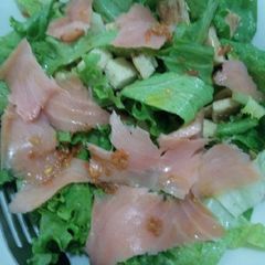 A picture of Salmon Salad in Carrot Ginger Dressing.