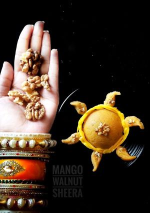મેંગો વોલનટ શીરા (Mango Walnut Sheera Recipe In Gujarati) રેસીપી મુખ્ય ફોટો