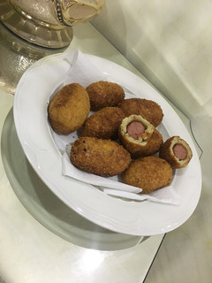 A picture of Coated sausage rolls.
