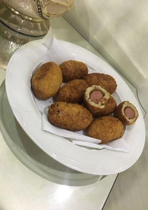 A picture of Coated sausage rolls.