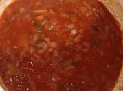 Una foto de salsa de tomate para pizza
