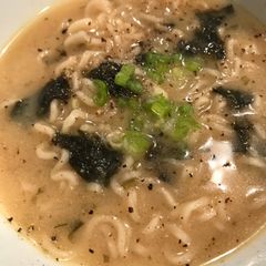 A picture of Miso Soup with Ramen Noodles.