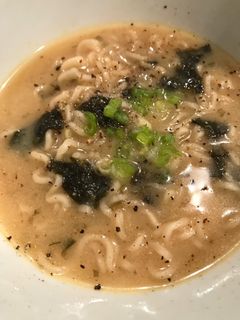 A picture of Miso Soup with Ramen Noodles.