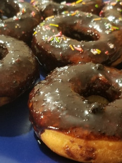 A picture of Doughnuts With Chocolate Topping.