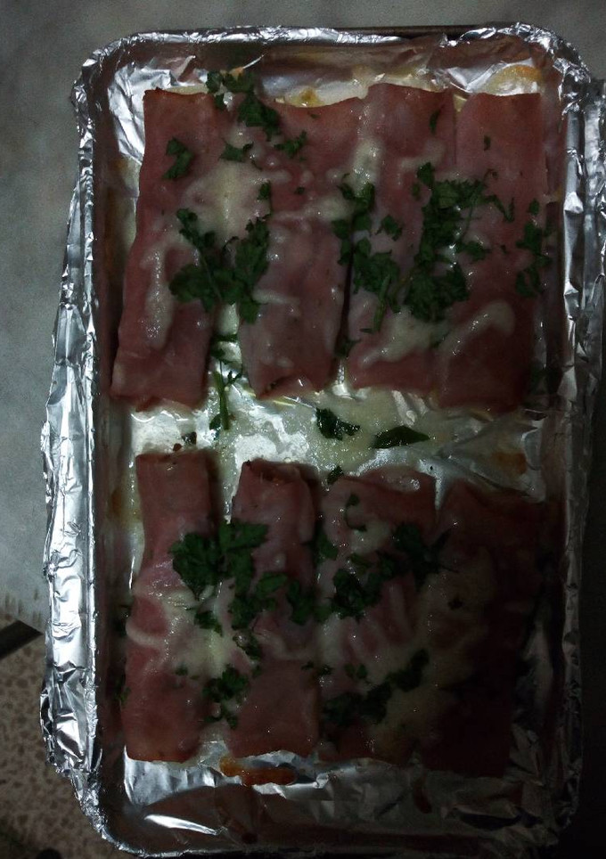 Una foto de Rollitos de jamón cocido con beicon y mozzarella