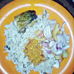A picture of Rice and beans with fish.