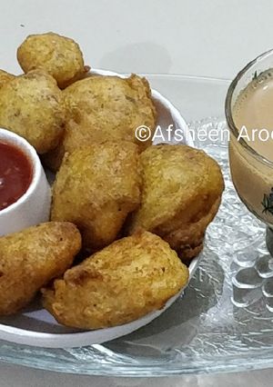 A picture of Egg Fritters with Tea.