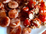 Banquetes con tomates cherry dulce, atún y orégano