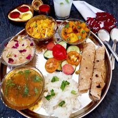 Gujarati thali for lunch A picture of Gujarati thali for lunch.