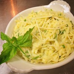 A picture of Basil Garlic Buttered Orzo with Parmesan Cheese.