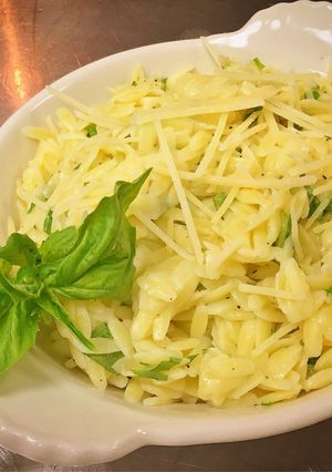 A picture of Basil Garlic Buttered Orzo with Parmesan Cheese.