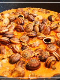 Una foto de Caracoles en salsa