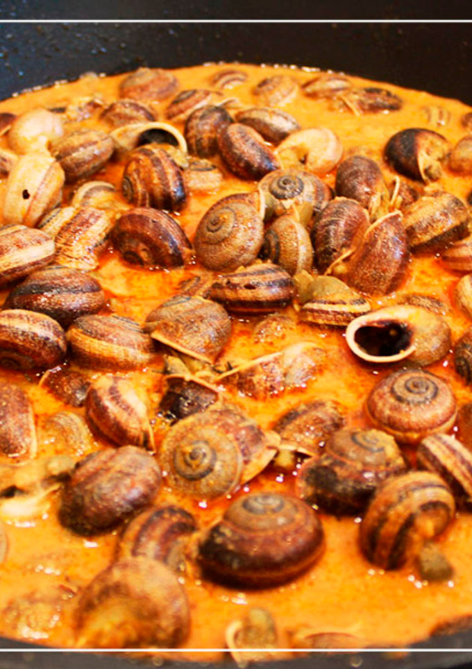 Una foto de Caracoles en salsa