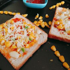 A picture of Chilli corn cheese toast.