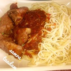 A picture of Spaghetti and stew.